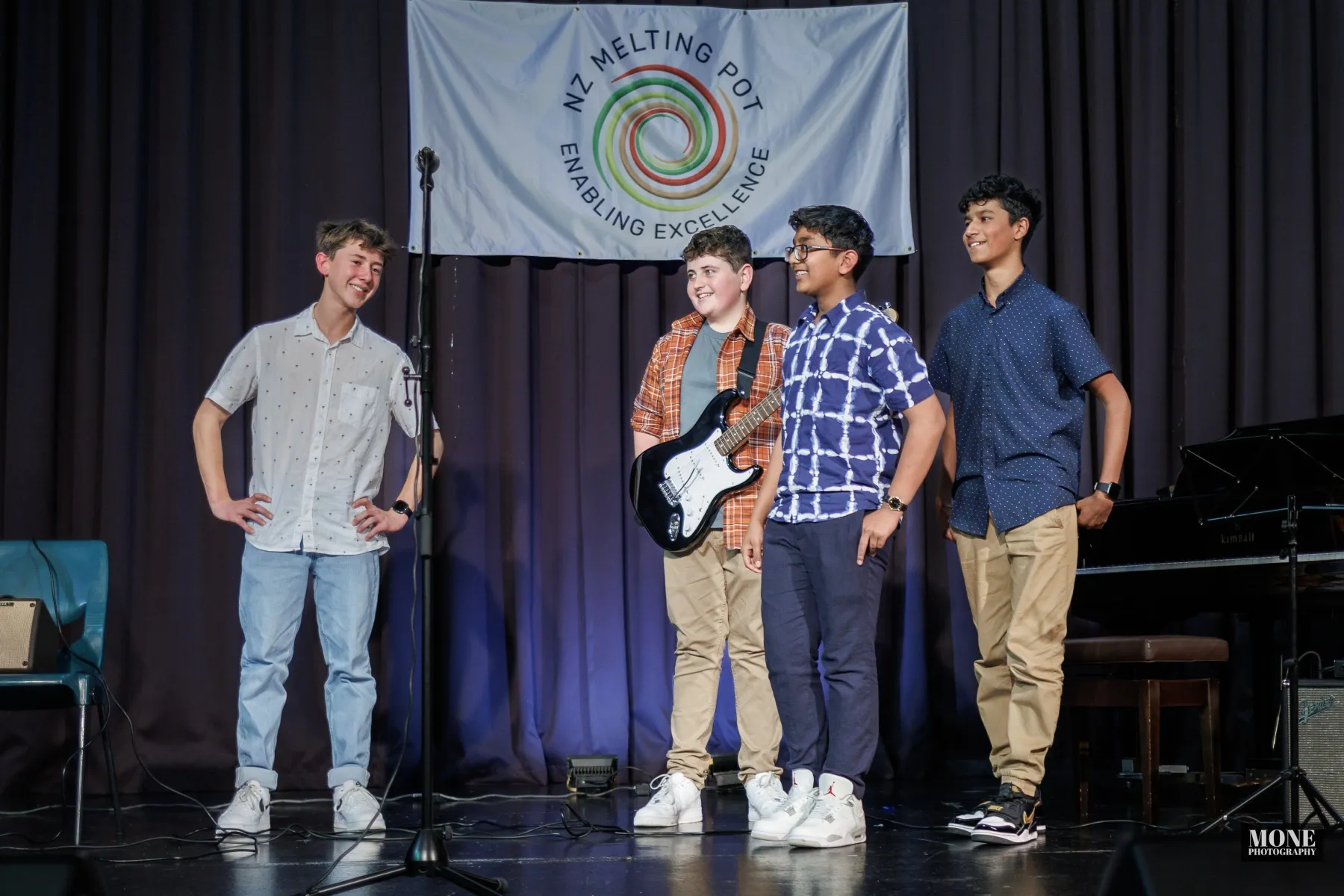 Vocalist on stage at the Talent Showcase